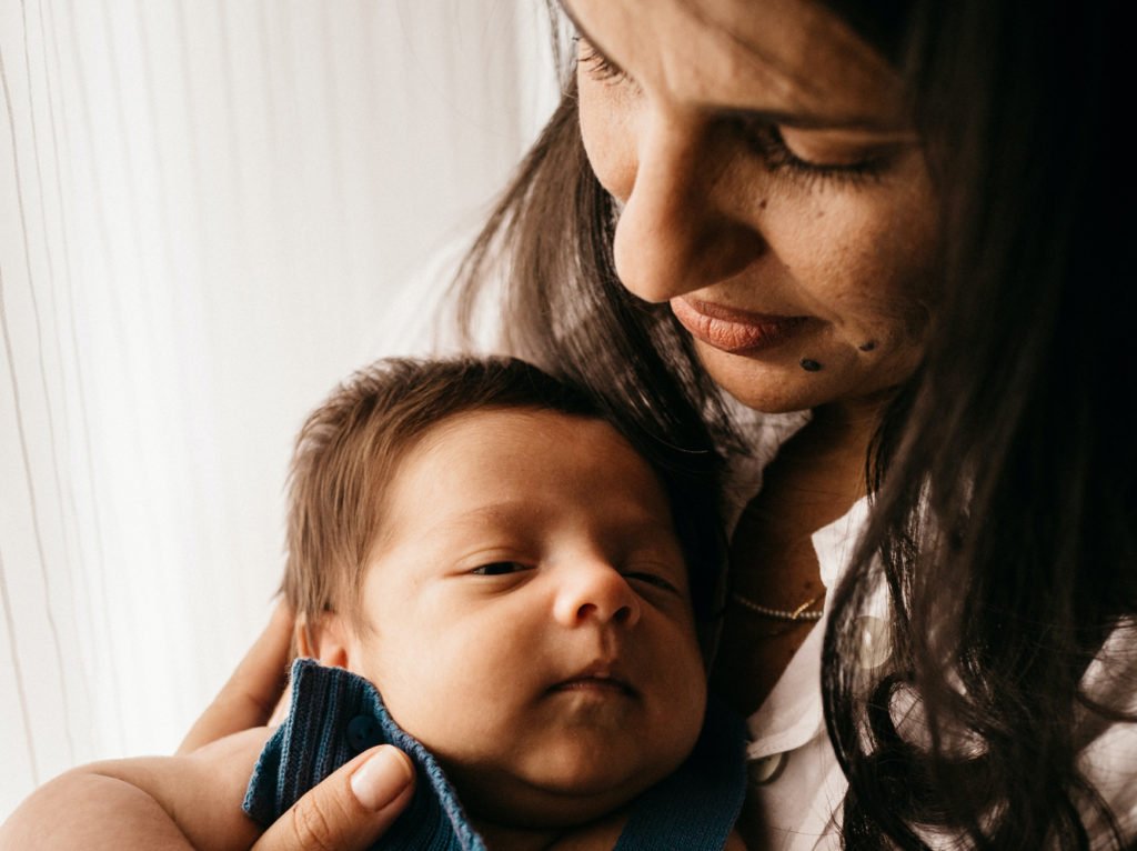 Mother holding her baby